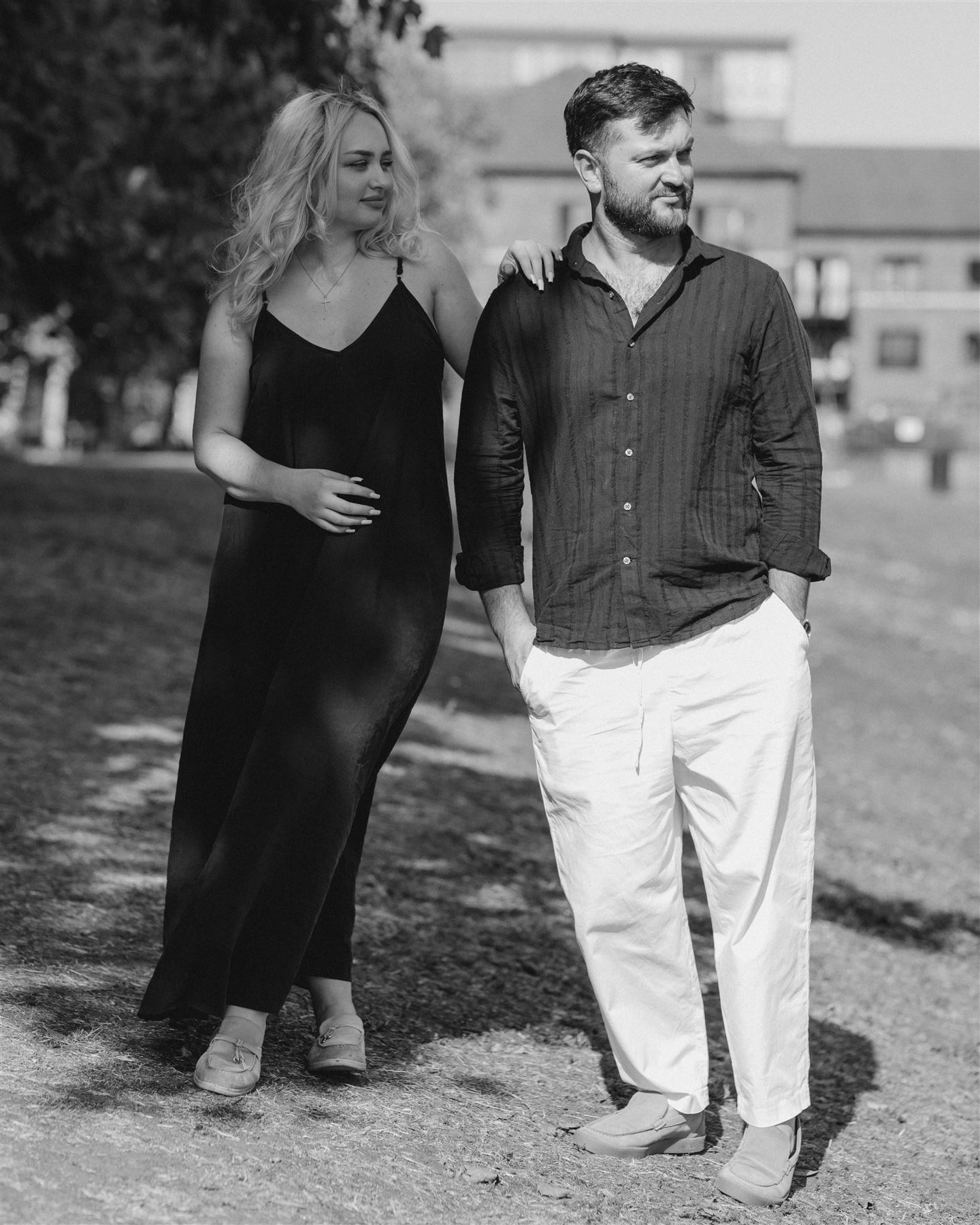 Couple walking through the park, black and white