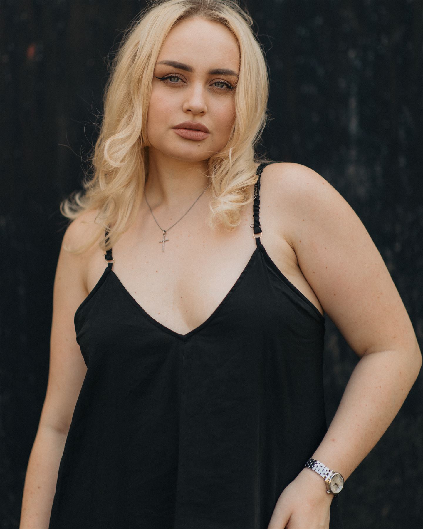 Portrait of a woman in a black dress
