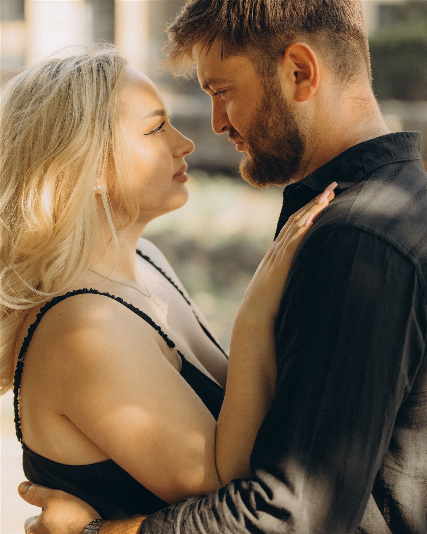 Couple embracing in afternoon light