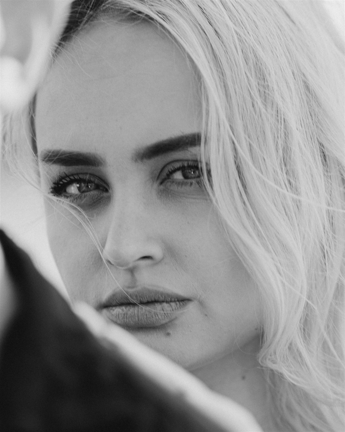 Black and white portrait, direct gaze